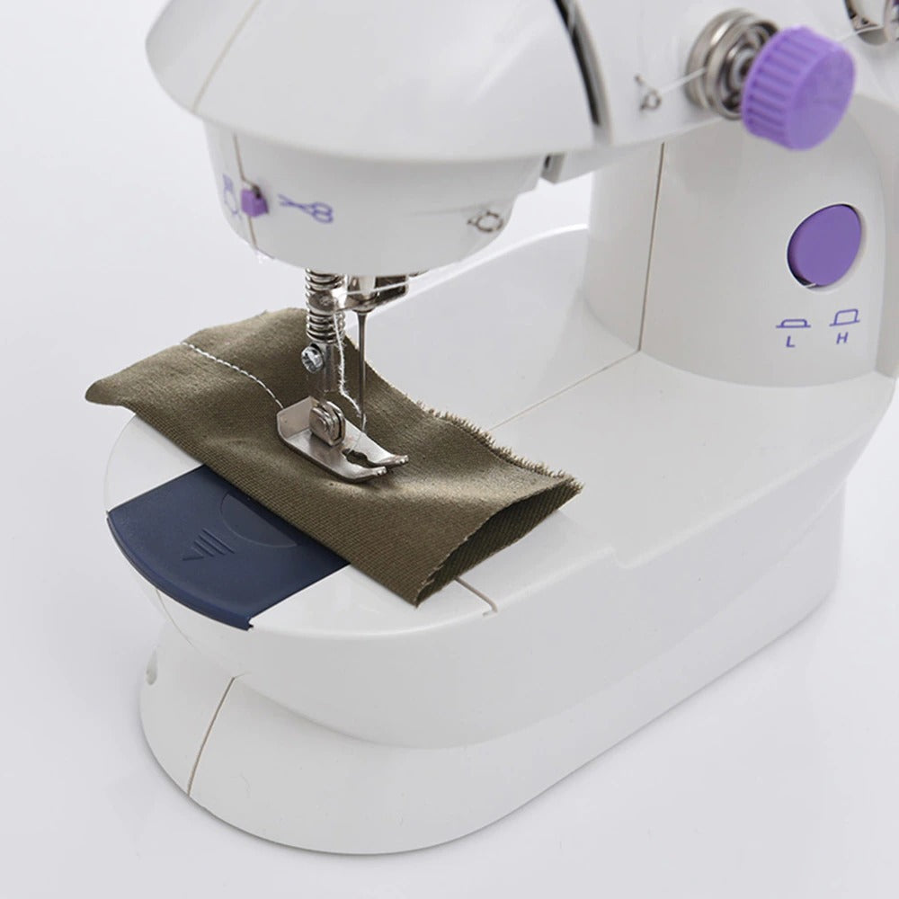 Maquina de coser portatil - SHOPYSV S.A de C.V